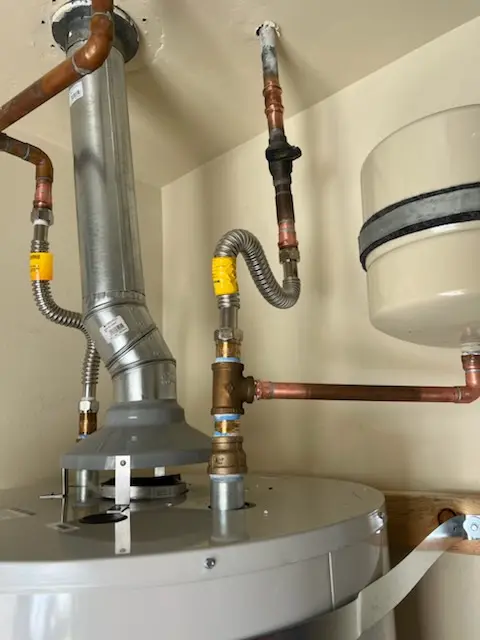 Water heater installation and plumbing repair in Marcy Holmes